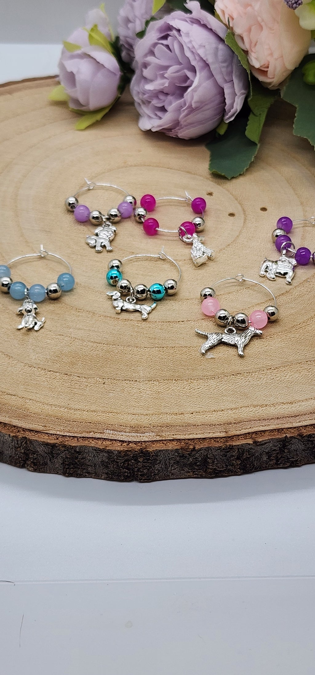 Wine glass markers with glass and gemstone beads and various themes of charms