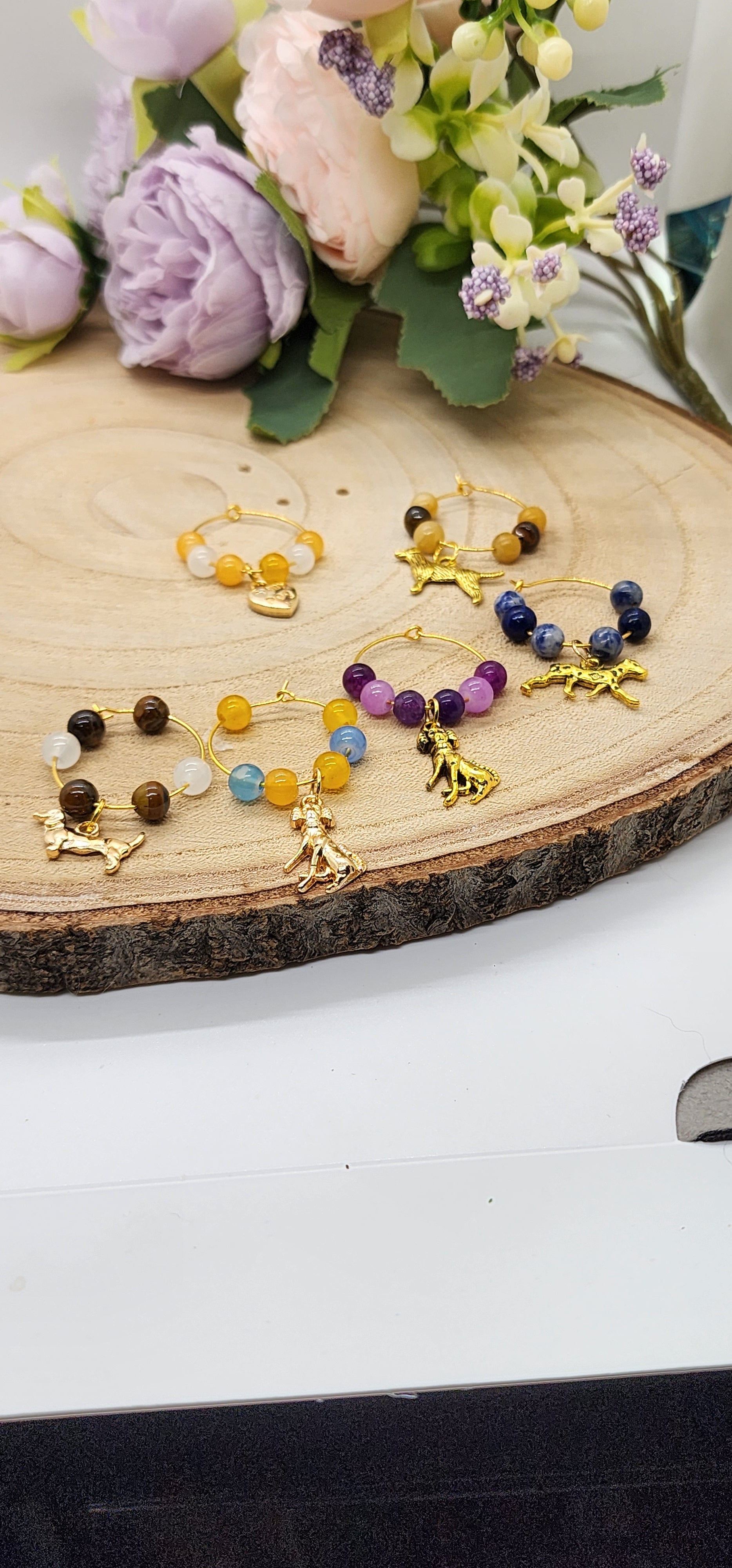 Wine glass markers with glass and gemstone beads and various themes of charms